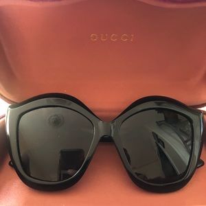 Black Gucci lip cat eye sunglasses